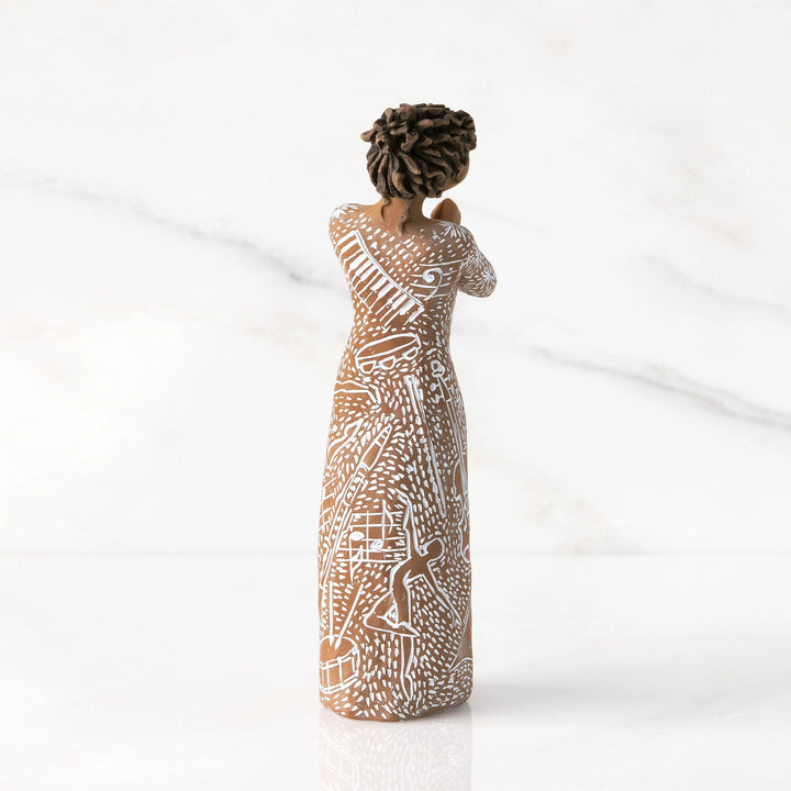 Music Speaks Figurine (darker skin and hair) by Willow Tree