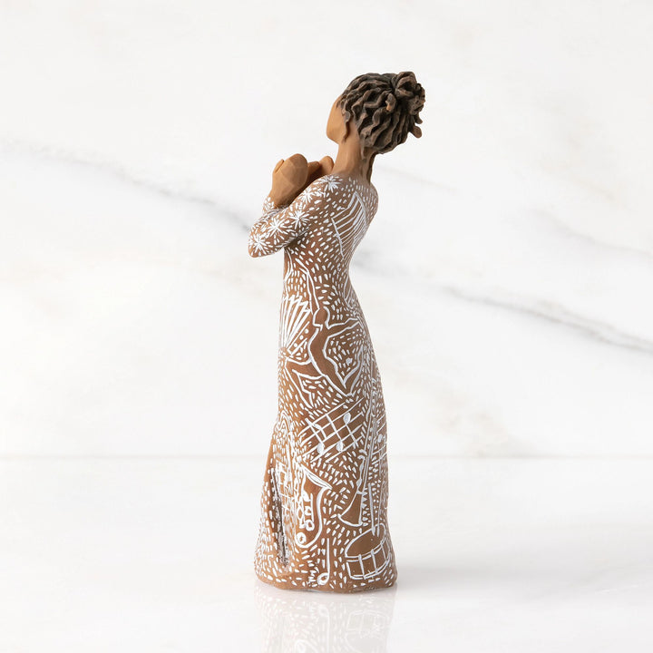 Music Speaks Figurine (darker skin and hair) by Willow Tree